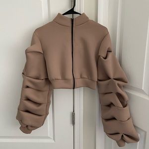 Puffy cropped jacket.